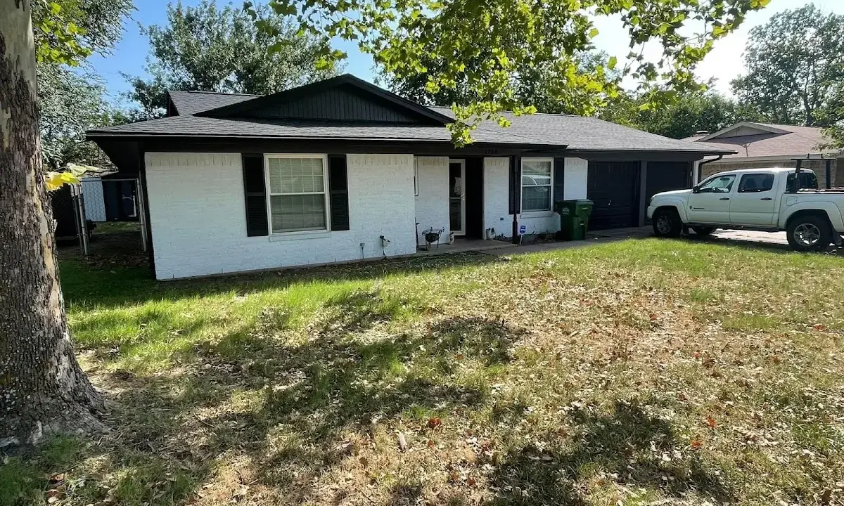Professional roofing crew working on a residential roof in Delray Beach